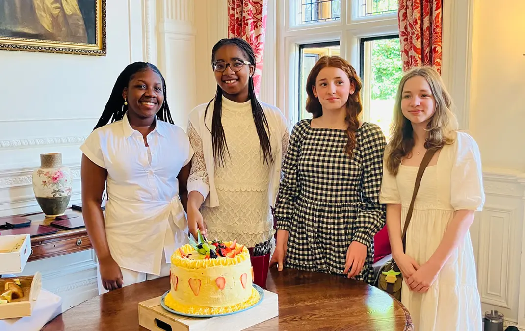 Students receive First Holy Communion on the Feast of Pentecost